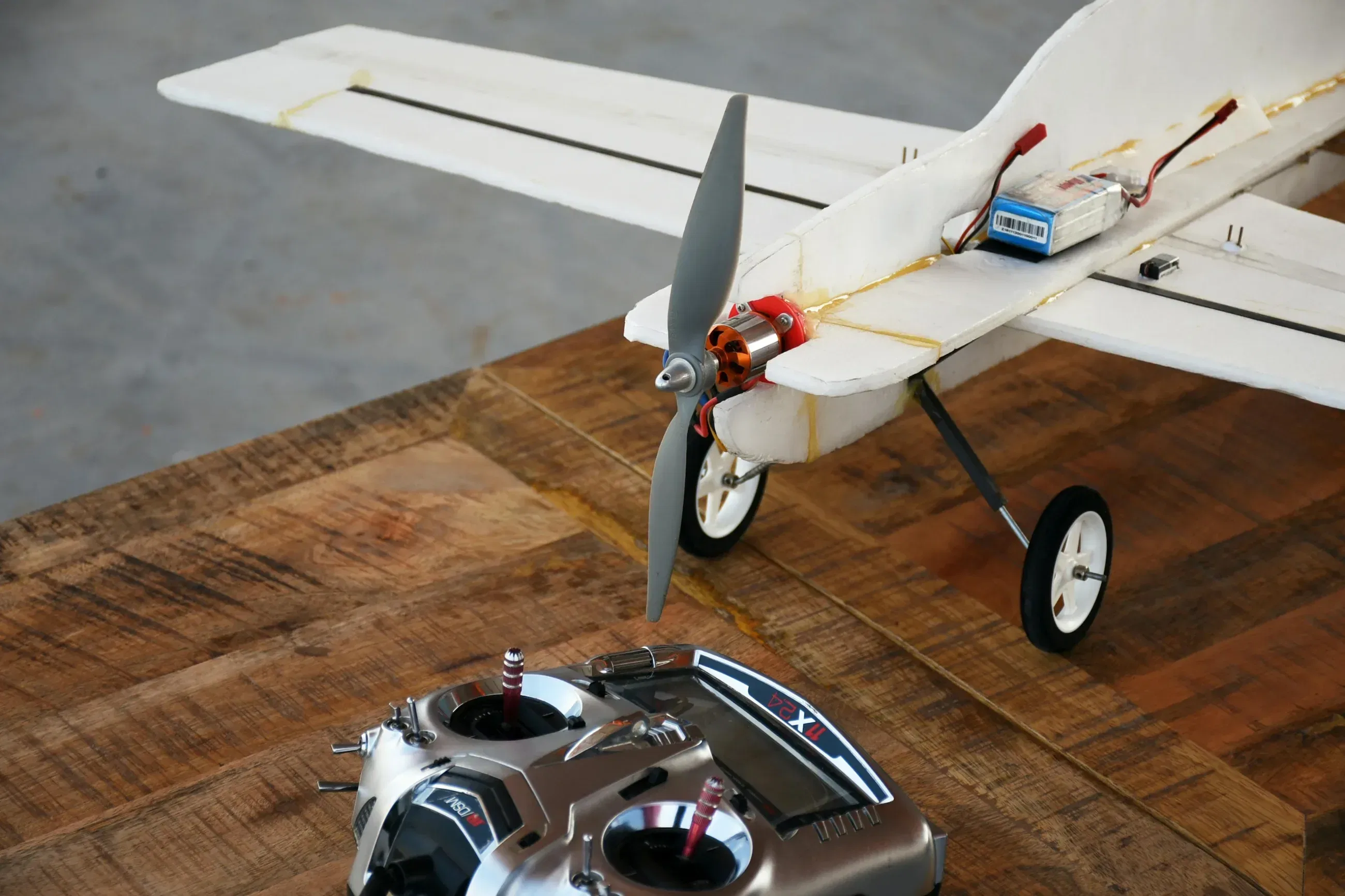 A DIY made aircraft rc model with a transmitter